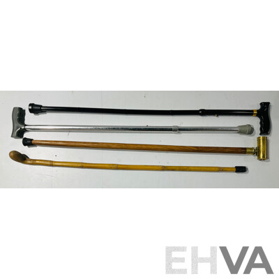 Collection of Canes Including Interesting Example with Brass Pipe Handle and More