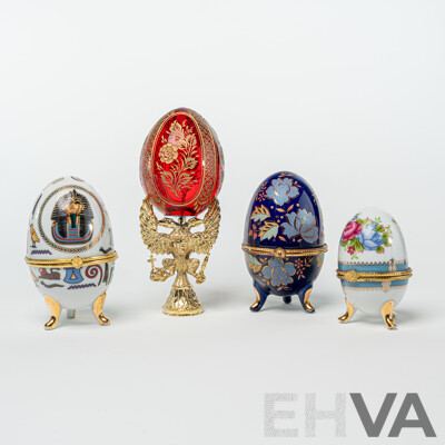 Collection Four Lidded Ceramic Eggs and Ruby Crystal with Etched Floral Detail Example Labeled Faberge to Base on Brass Stand