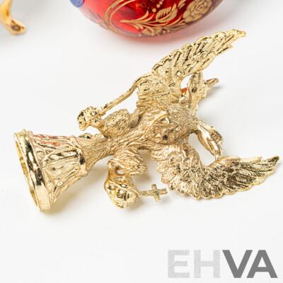 Collection Four Lidded Ceramic Eggs and Ruby Crystal with Etched Floral Detail Example Labeled Faberge to Base on Brass Stand