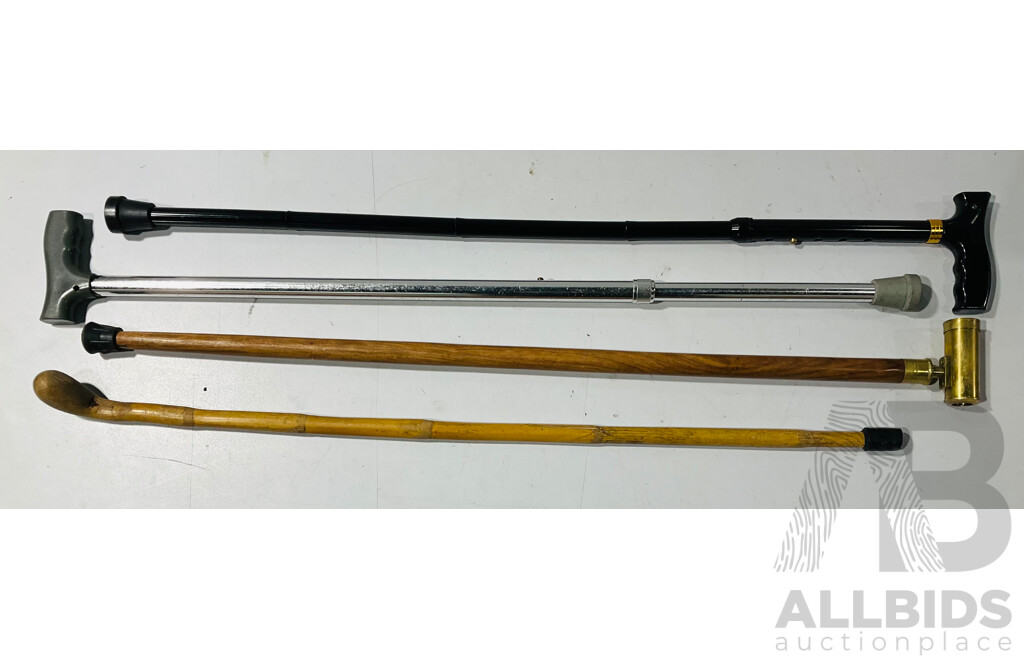 Collection of Canes Including Interesting Example with Brass Pipe Handle and More