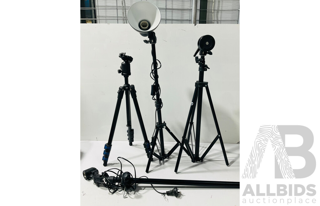 Collection of Tripods with Various Attachment Points and Lamp