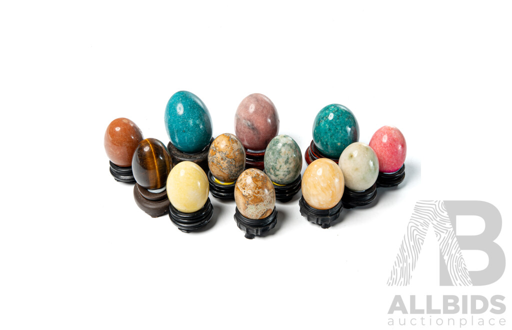 Collection Twelve Stone Eggs on Wooden Stands Including Tigers Eye, Quartz and More