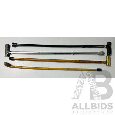 Collection of Canes Including Interesting Example with Brass Pipe Handle and More