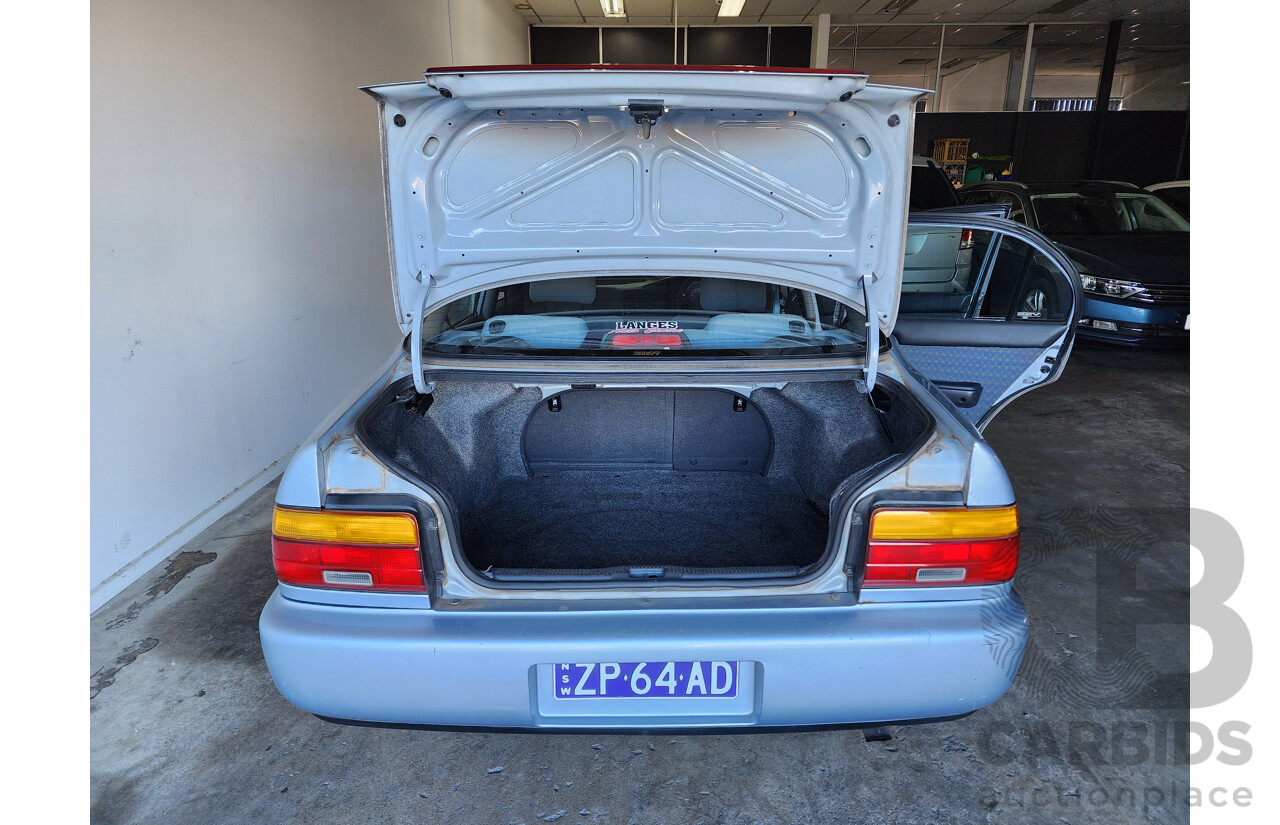 04/1999 Toyota Corolla CONQUEST FWD AE102R 4D Sedan Silver 1.8L