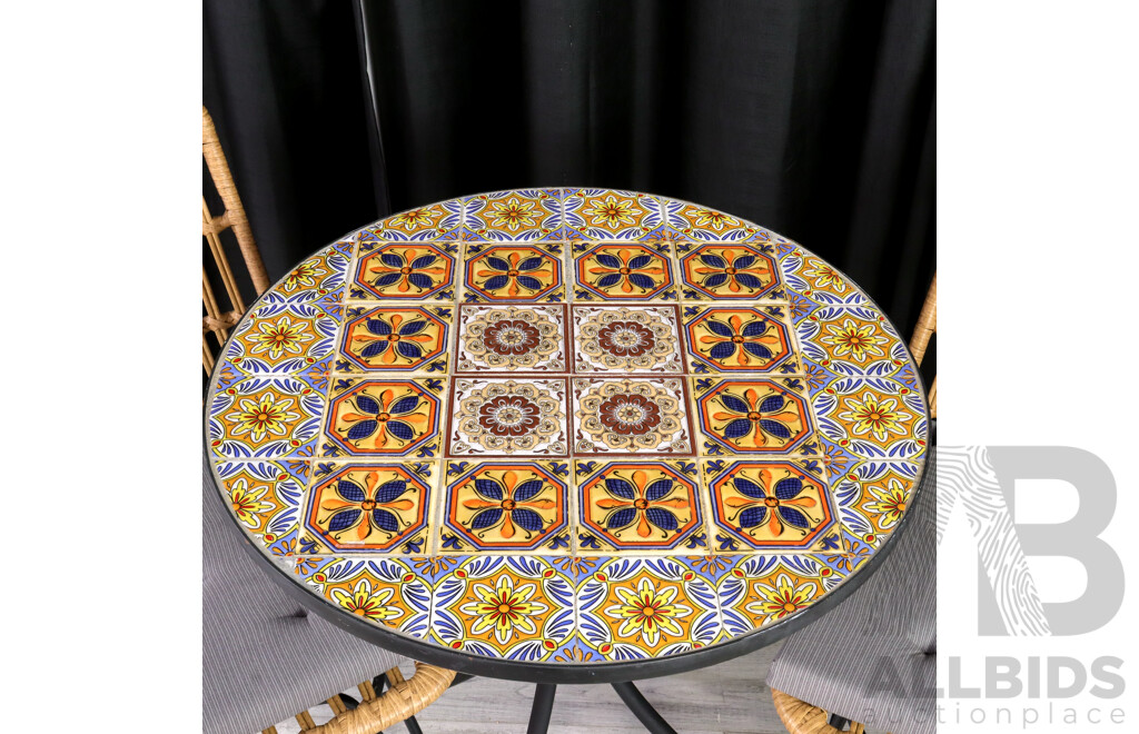 Three Piece Outdoor Setting with Two Cane Wrapped and Metal Chairs and Tile Top Table