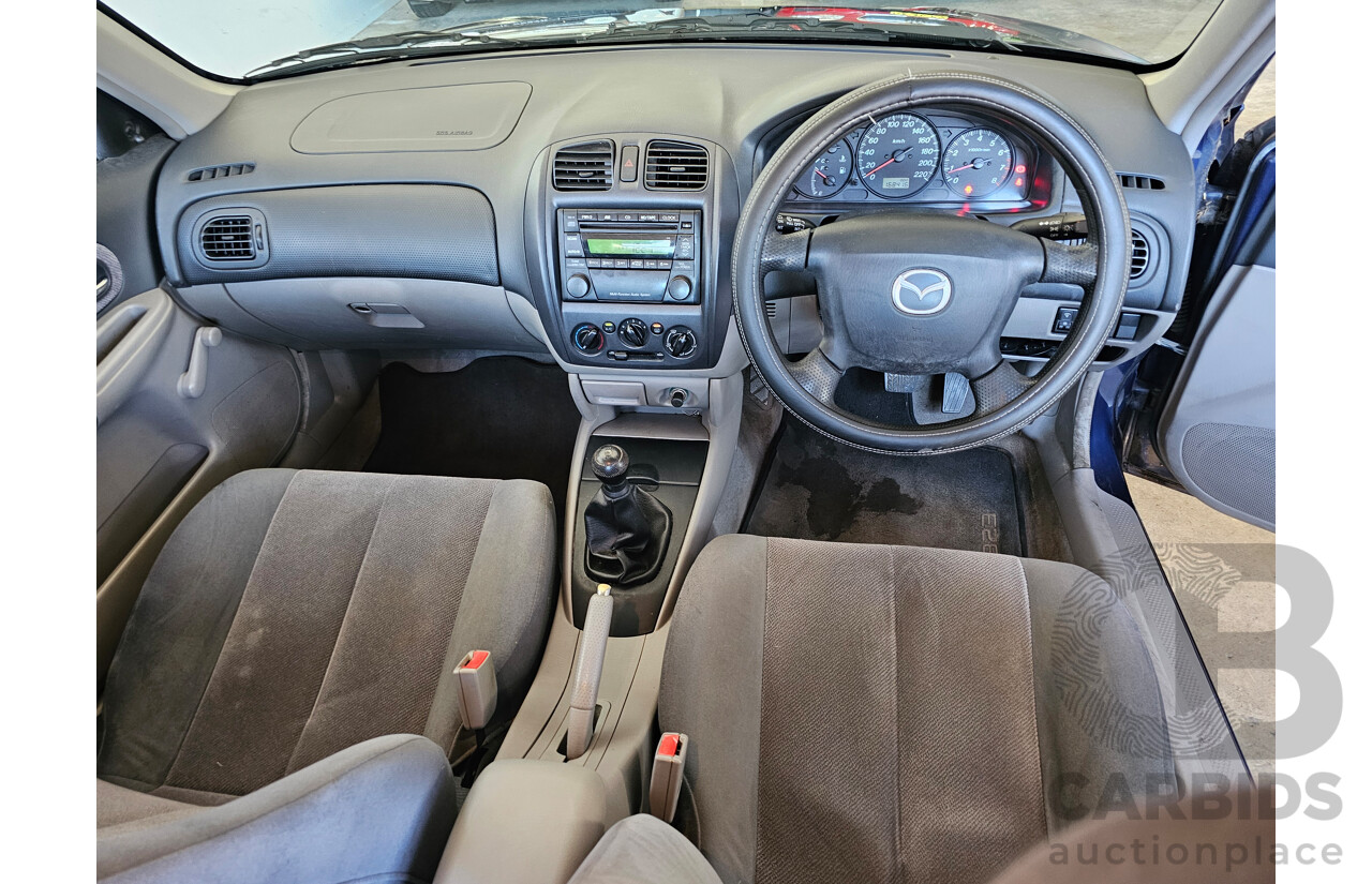 8/2002 Mazda 323 Astina  5d Hatchback Blue 1.8L