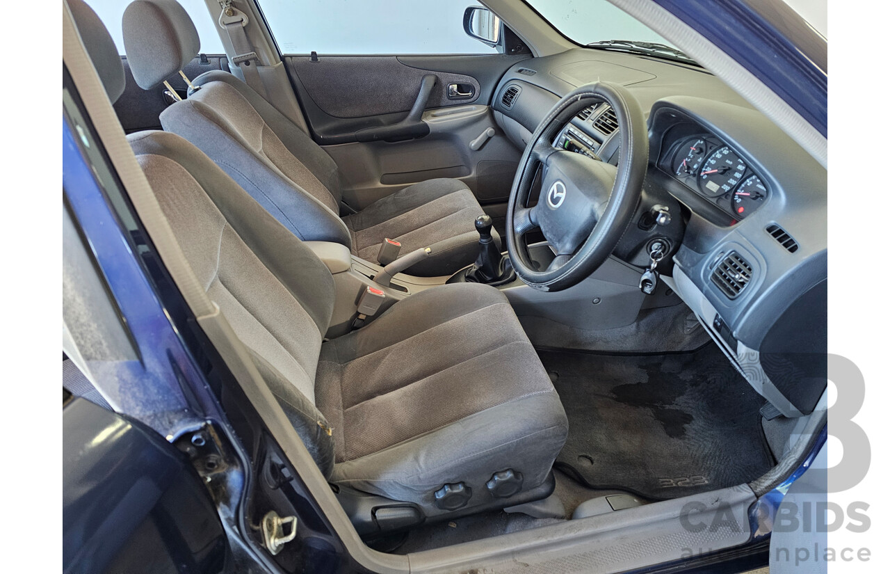 8/2002 Mazda 323 Astina  5d Hatchback Blue 1.8L