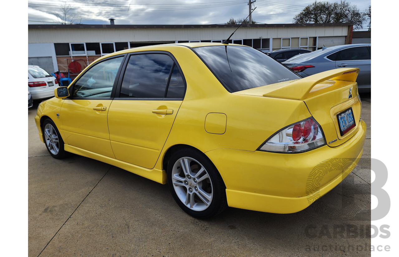 06/2006 Mitsubishi Lancer VR-X FWD CH MY06 4D Sedan Yellow 2.4L