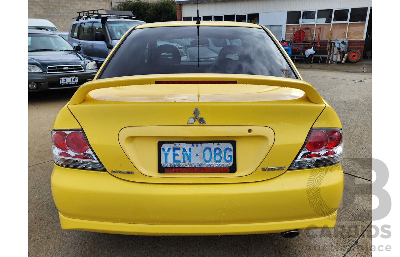 06/2006 Mitsubishi Lancer VR-X FWD CH MY06 4D Sedan Yellow 2.4L