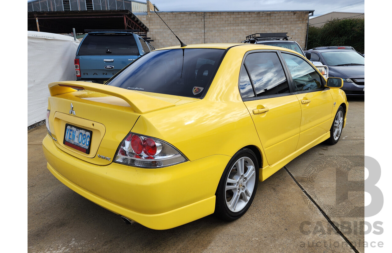 06/2006 Mitsubishi Lancer VR-X FWD CH MY06 4D Sedan Yellow 2.4L