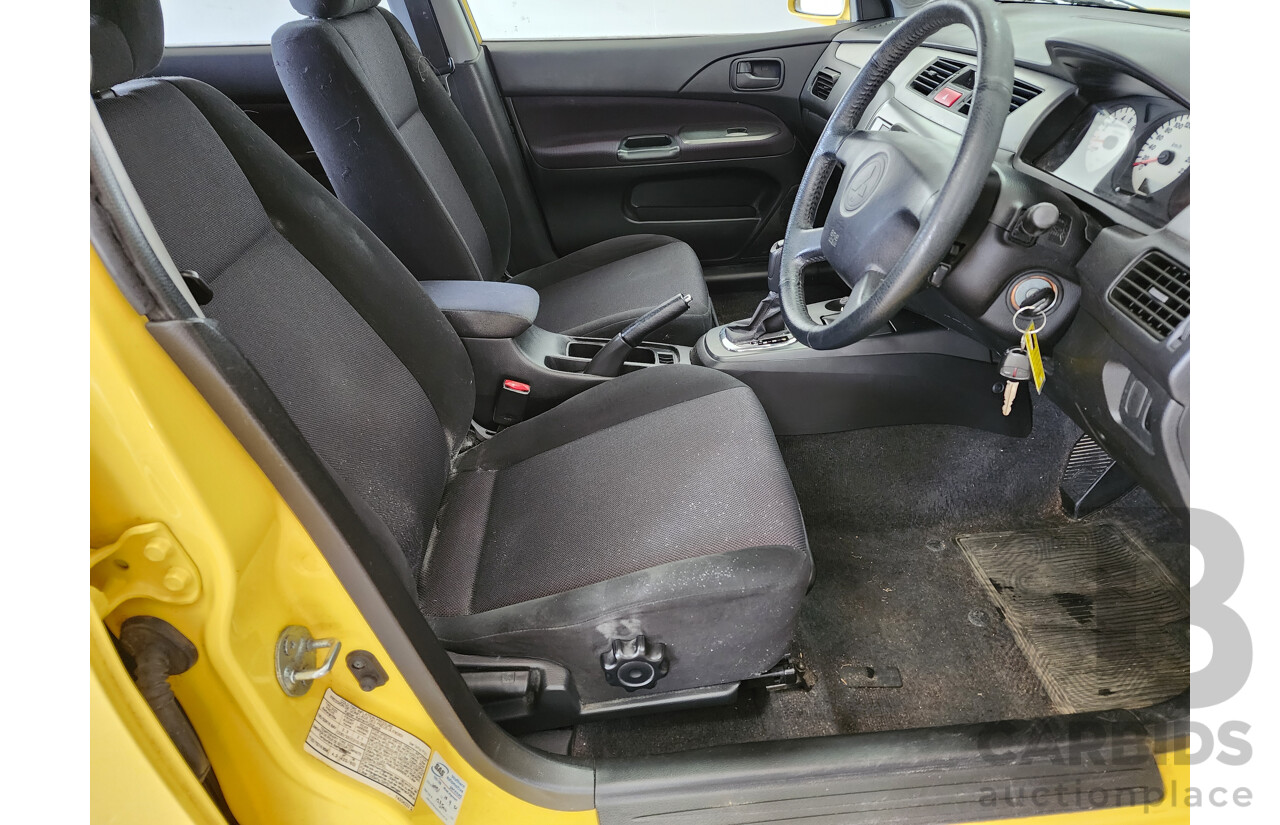 06/2006 Mitsubishi Lancer VR-X FWD CH MY06 4D Sedan Yellow 2.4L