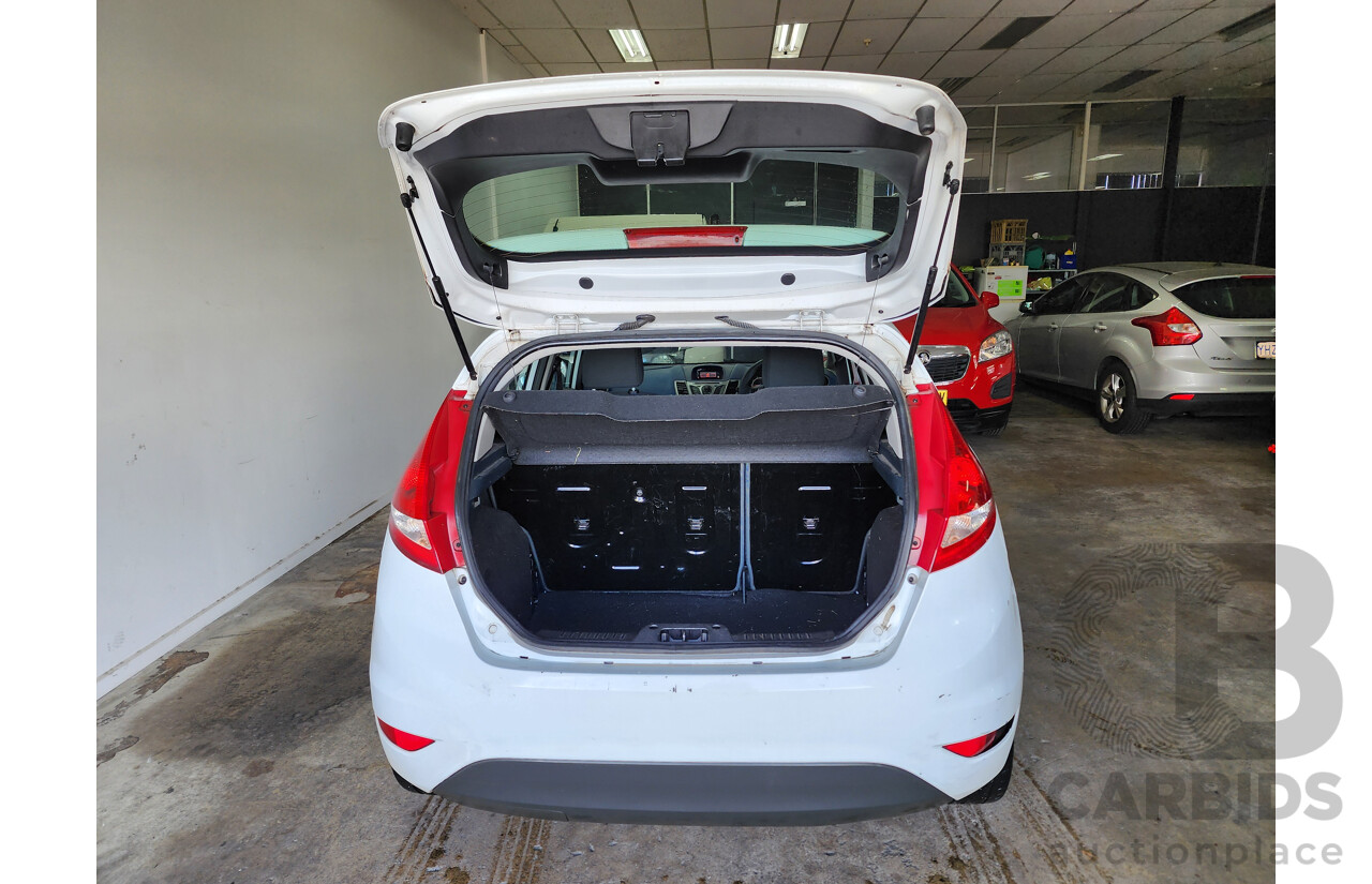 06/2009 Ford Fiesta CL FWD WS 5D Hatchback White 1.4L