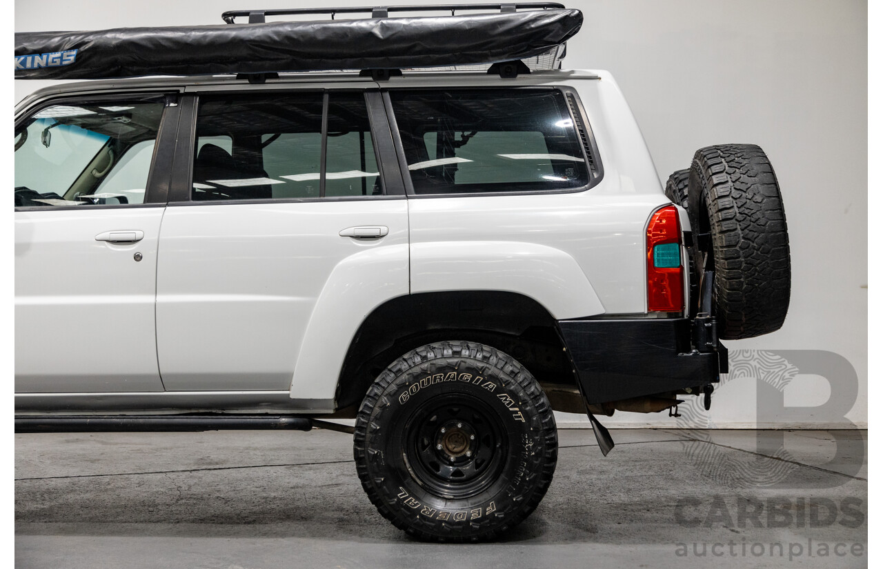 10/2004 Nissan Patrol ST (4x4) GU IV 4d Wagon White Turbo Diesel 3.0L