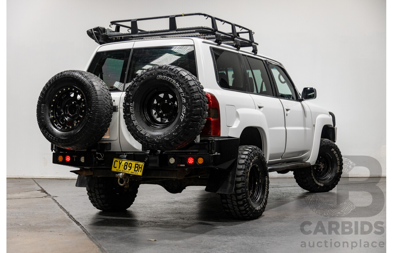 10/2004 Nissan Patrol ST (4x4) GU IV 4d Wagon White Turbo Diesel 3.0L