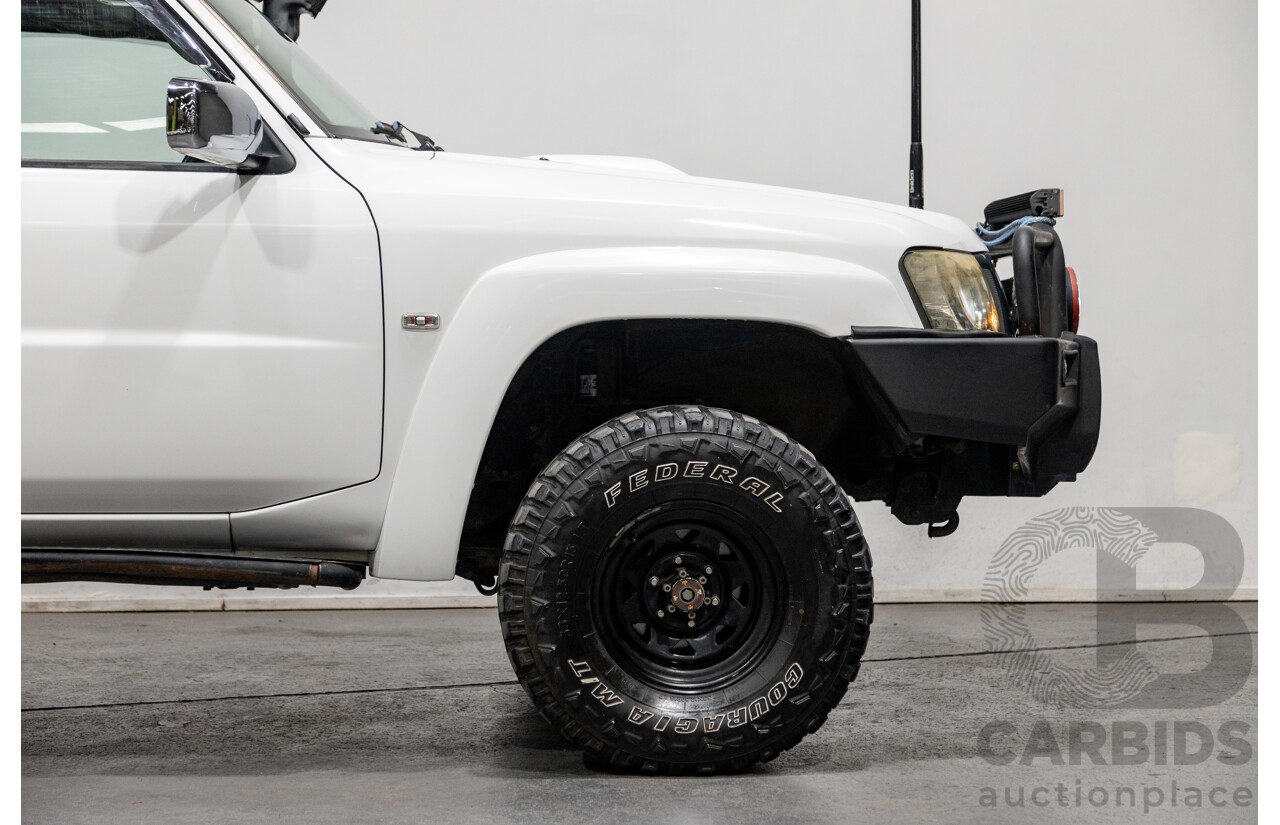 10/2004 Nissan Patrol ST (4x4) GU IV 4d Wagon White Turbo Diesel 3.0L