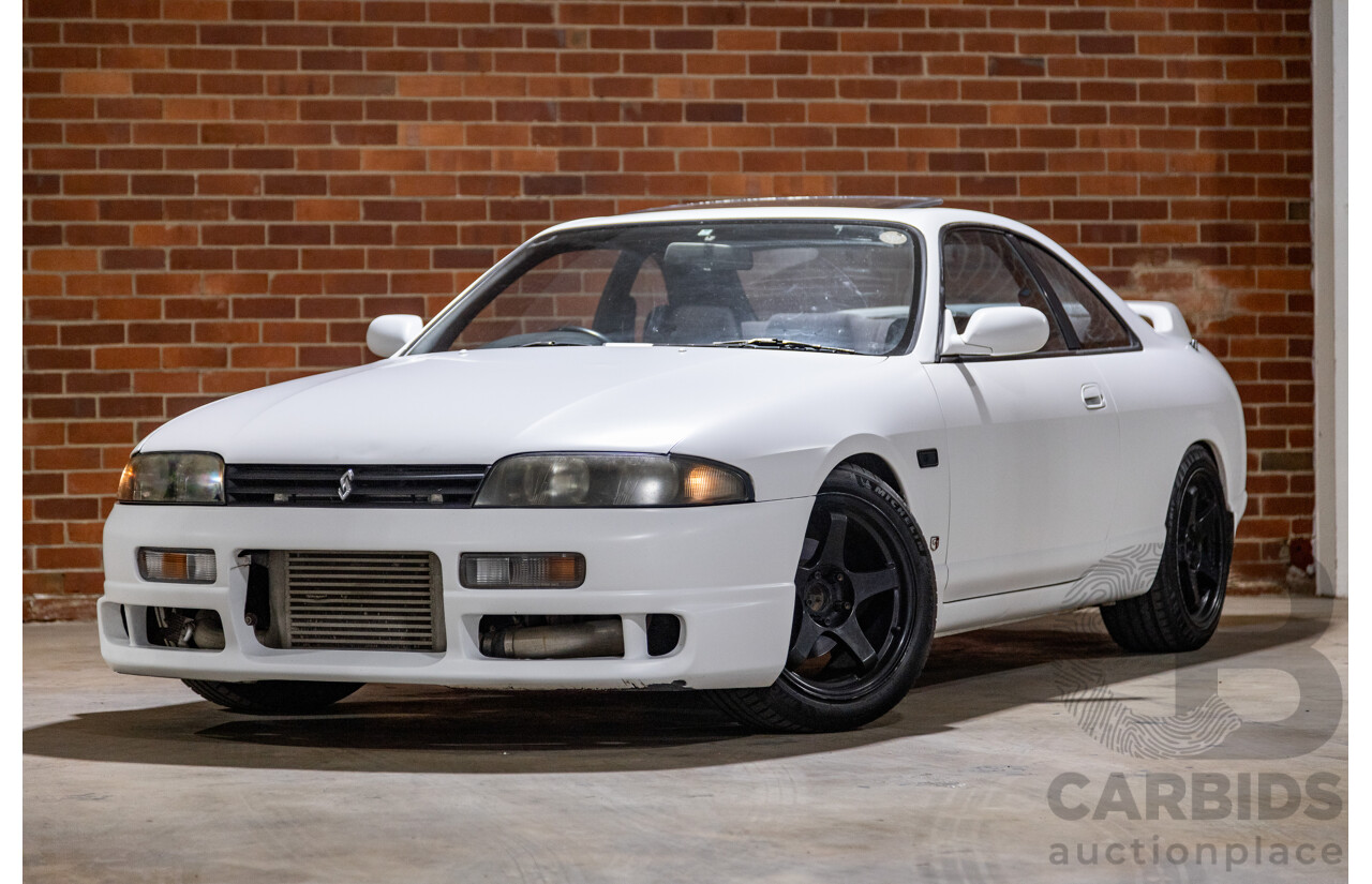 10/1994 Nissan Skyline R33 2d Coupe Ivory Matte White Wrap Turbo 4.0L - Modified with Barra Conversion - 07/2008 Import