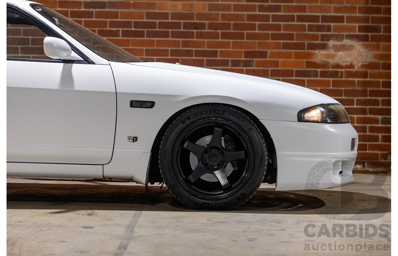 10/1994 Nissan Skyline R33 2d Coupe Ivory Matte White Wrap Turbo 4.0L - Modified with Barra Conversion - 07/2008 Import