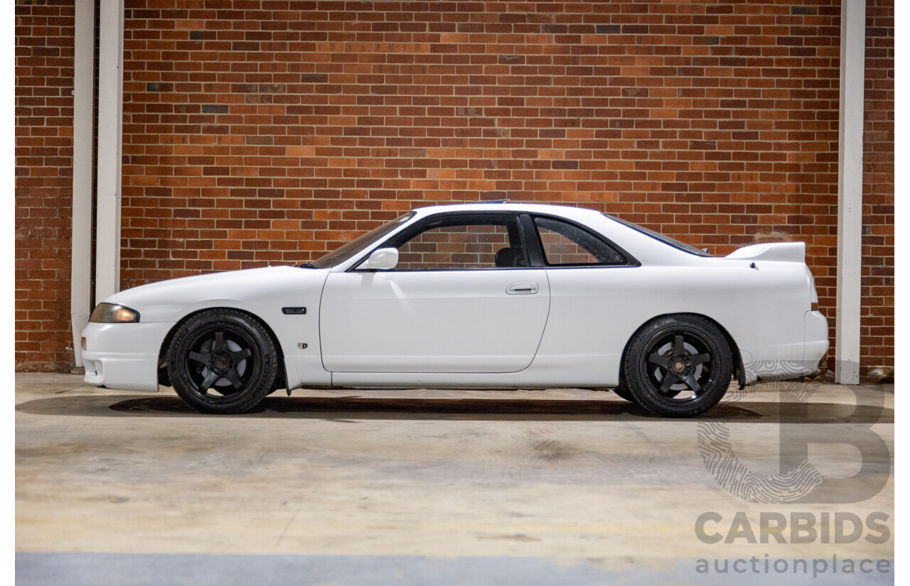 10/1994 Nissan Skyline R33 2d Coupe Ivory Matte White Wrap Turbo 4.0L - Modified with Barra Conversion - 07/2008 Import