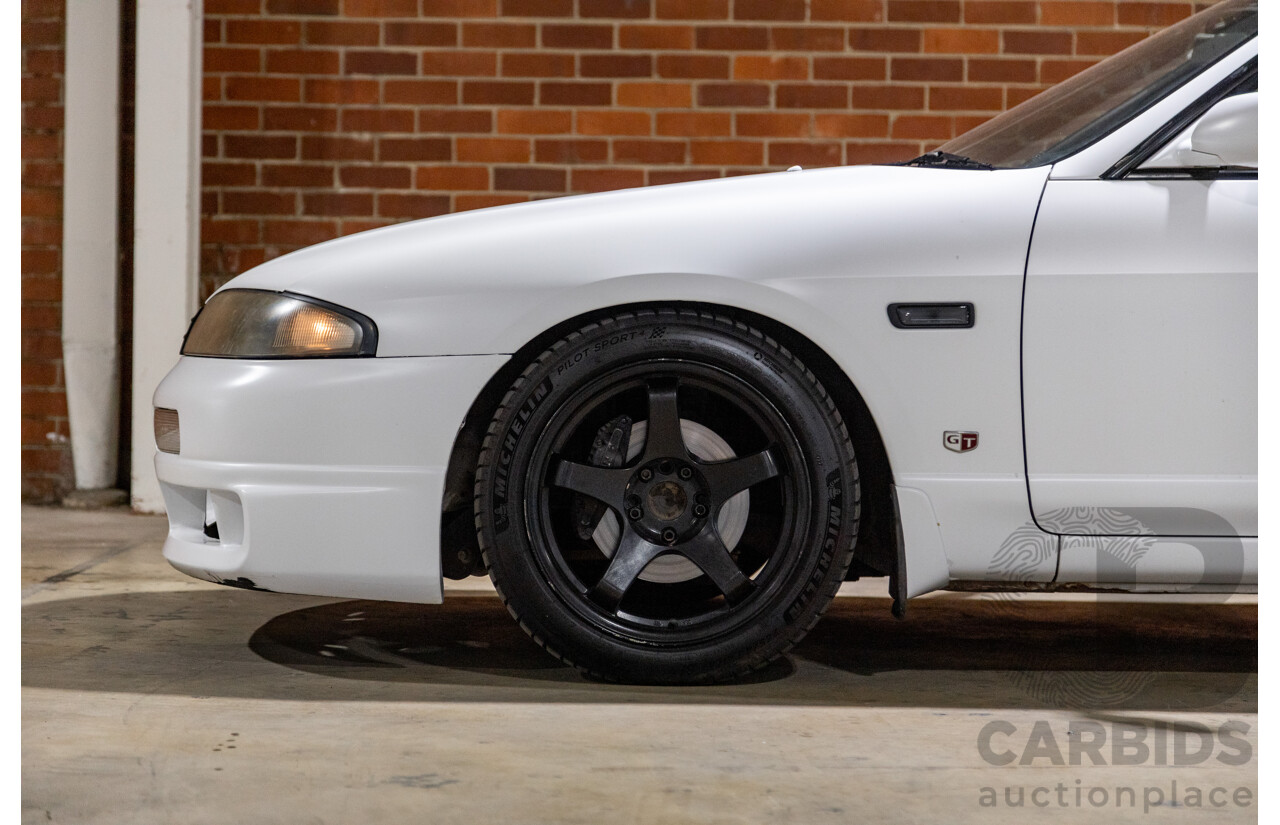 10/1994 Nissan Skyline R33 2d Coupe Ivory Matte White Wrap Turbo 4.0L - Modified with Barra Conversion - 07/2008 Import