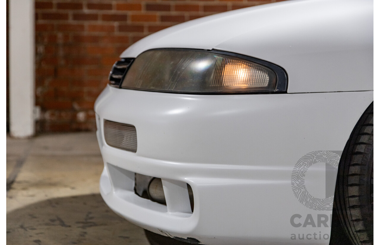 10/1994 Nissan Skyline R33 2d Coupe Ivory Matte White Wrap Turbo 4.0L - Modified with Barra Conversion - 07/2008 Import