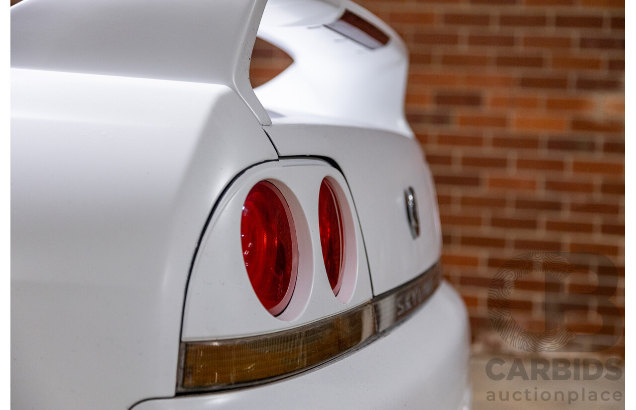 10/1994 Nissan Skyline R33 2d Coupe Ivory Matte White Wrap Turbo 4.0L - Modified with Barra Conversion - 07/2008 Import