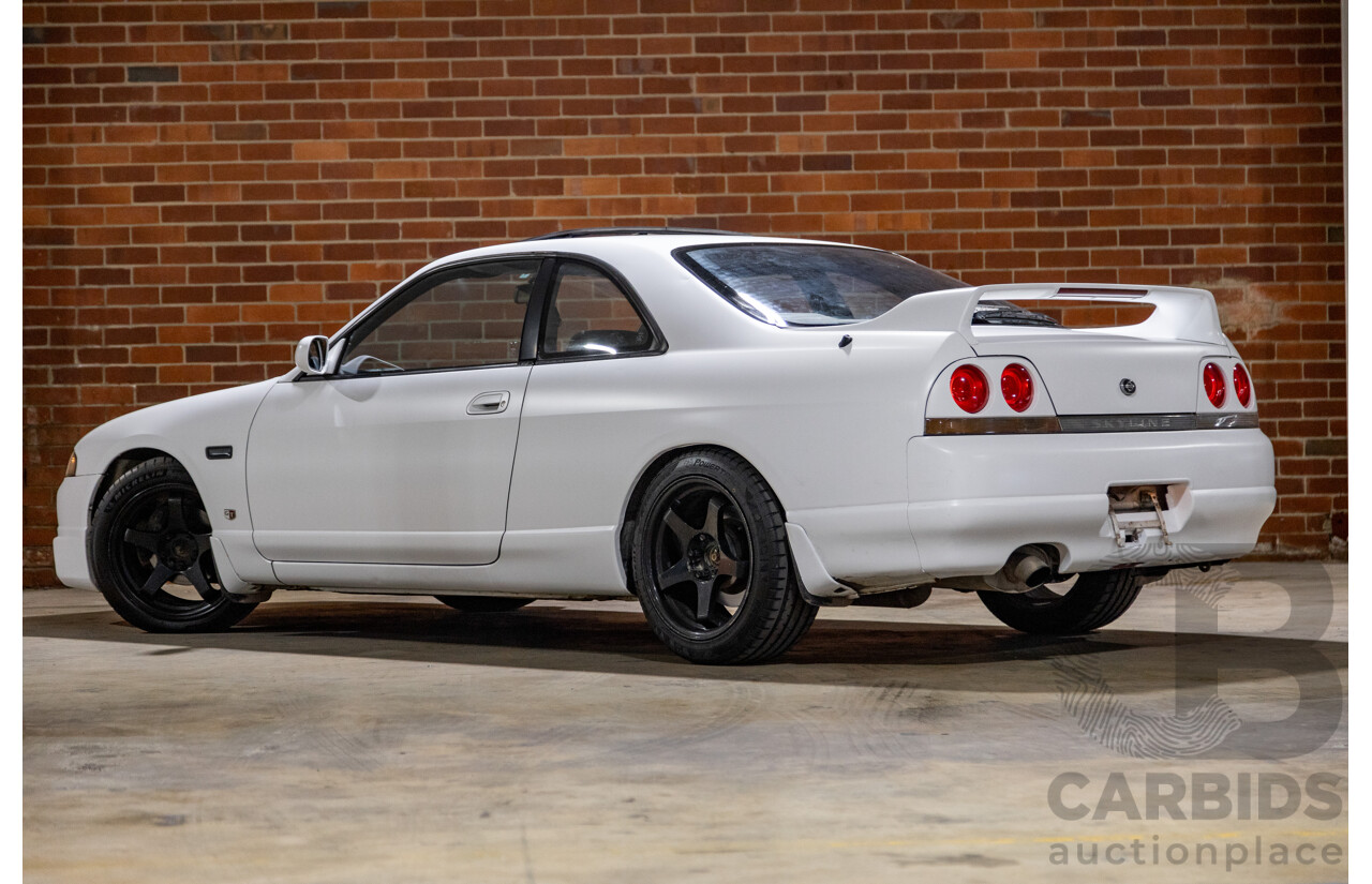 10/1994 Nissan Skyline R33 2d Coupe Ivory Matte White Wrap Turbo 4.0L - Modified with Barra Conversion - 07/2008 Import