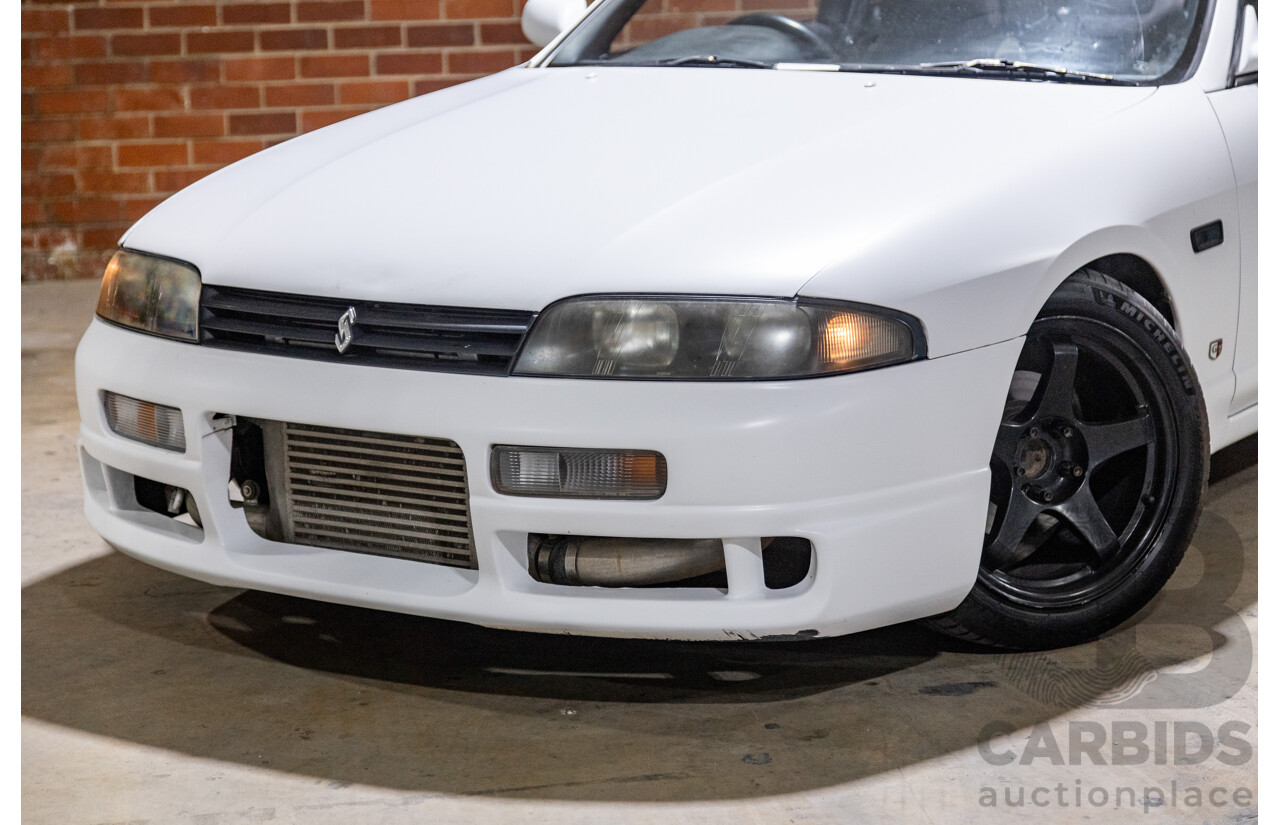 10/1994 Nissan Skyline R33 2d Coupe Ivory Matte White Wrap Turbo 4.0L - Modified with Barra Conversion - 07/2008 Import