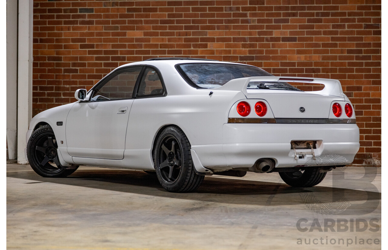 10/1994 Nissan Skyline R33 2d Coupe Ivory Matte White Wrap Turbo 4.0L - Modified with Barra Conversion - 07/2008 Import