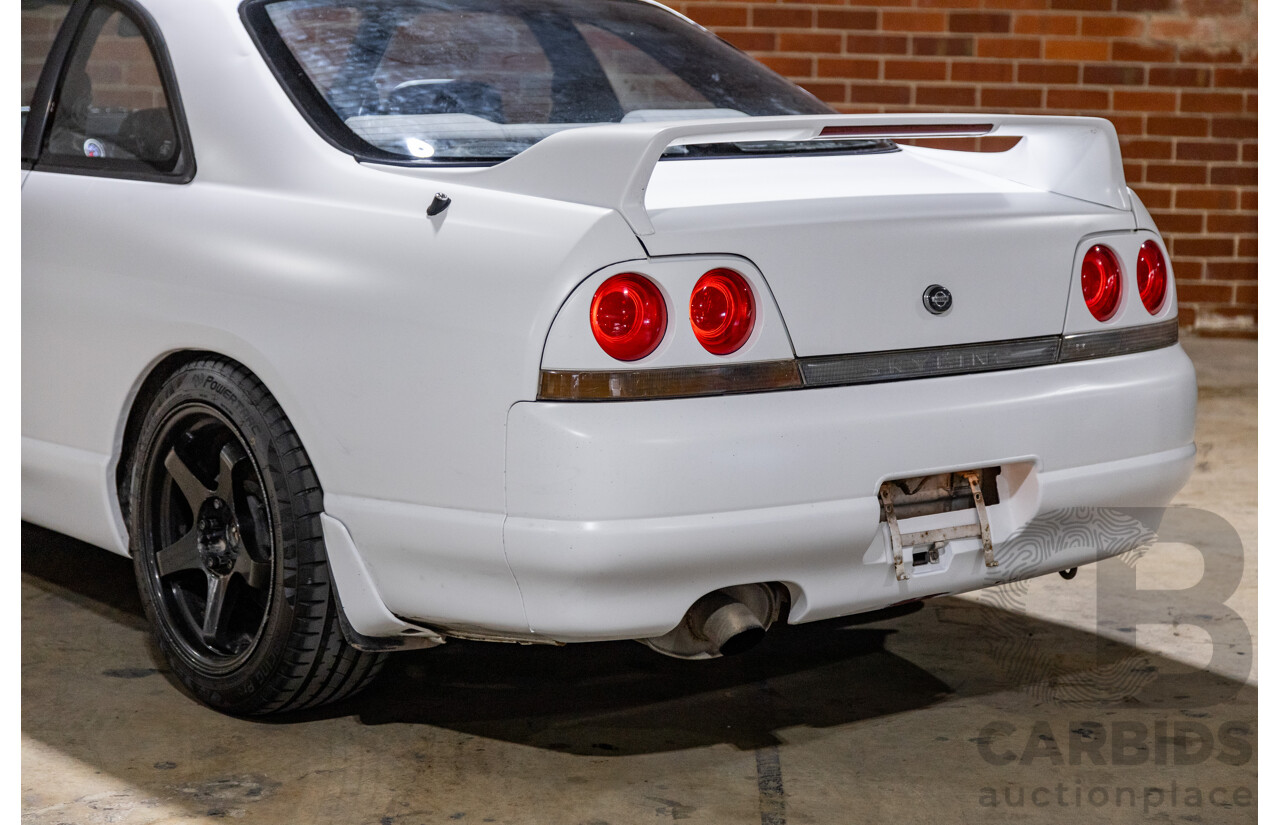 10/1994 Nissan Skyline R33 2d Coupe Ivory Matte White Wrap Turbo 4.0L - Modified with Barra Conversion - 07/2008 Import