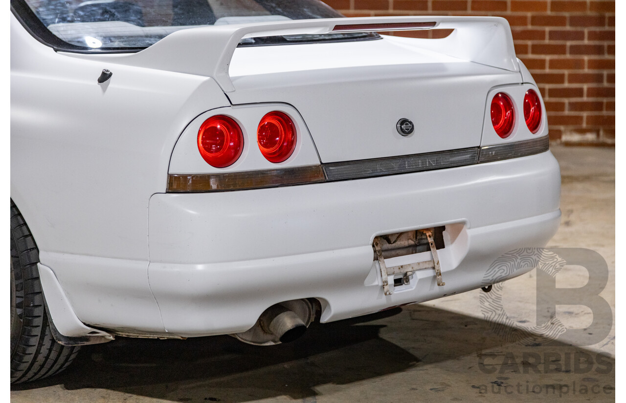 10/1994 Nissan Skyline R33 2d Coupe Ivory Matte White Wrap Turbo 4.0L - Modified with Barra Conversion - 07/2008 Import