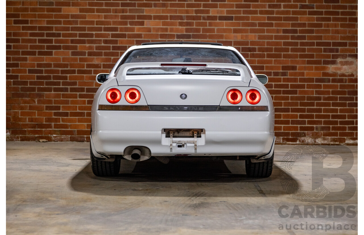 10/1994 Nissan Skyline R33 2d Coupe Ivory Matte White Wrap Turbo 4.0L - Modified with Barra Conversion - 07/2008 Import