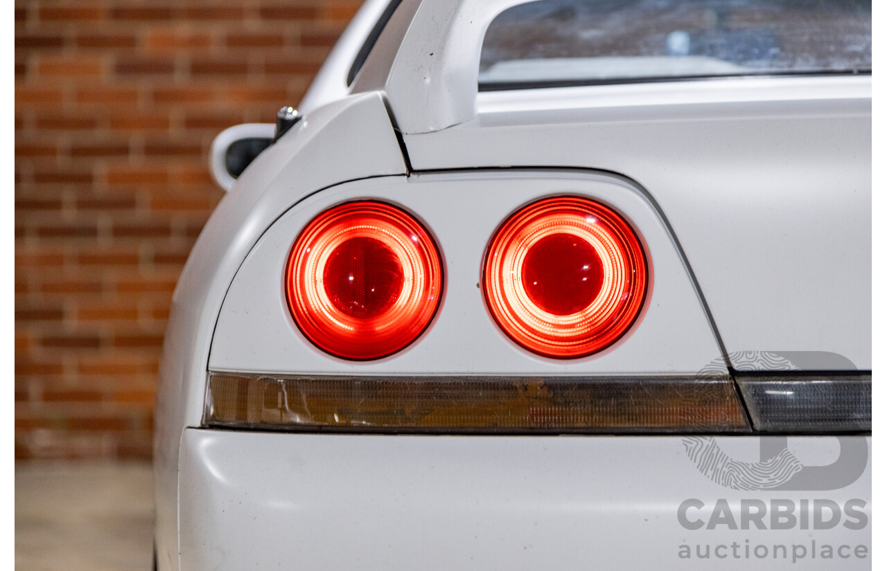 10/1994 Nissan Skyline R33 2d Coupe Ivory Matte White Wrap Turbo 4.0L - Modified with Barra Conversion - 07/2008 Import