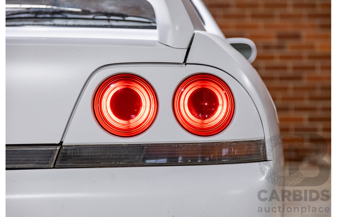 10/1994 Nissan Skyline R33 2d Coupe Ivory Matte White Wrap Turbo 4.0L - Modified with Barra Conversion - 07/2008 Import