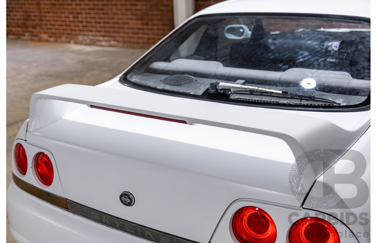 10/1994 Nissan Skyline R33 2d Coupe Ivory Matte White Wrap Turbo 4.0L - Modified with Barra Conversion - 07/2008 Import