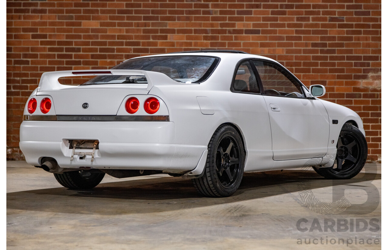 10/1994 Nissan Skyline R33 2d Coupe Ivory Matte White Wrap Turbo 4.0L - Modified with Barra Conversion - 07/2008 Import