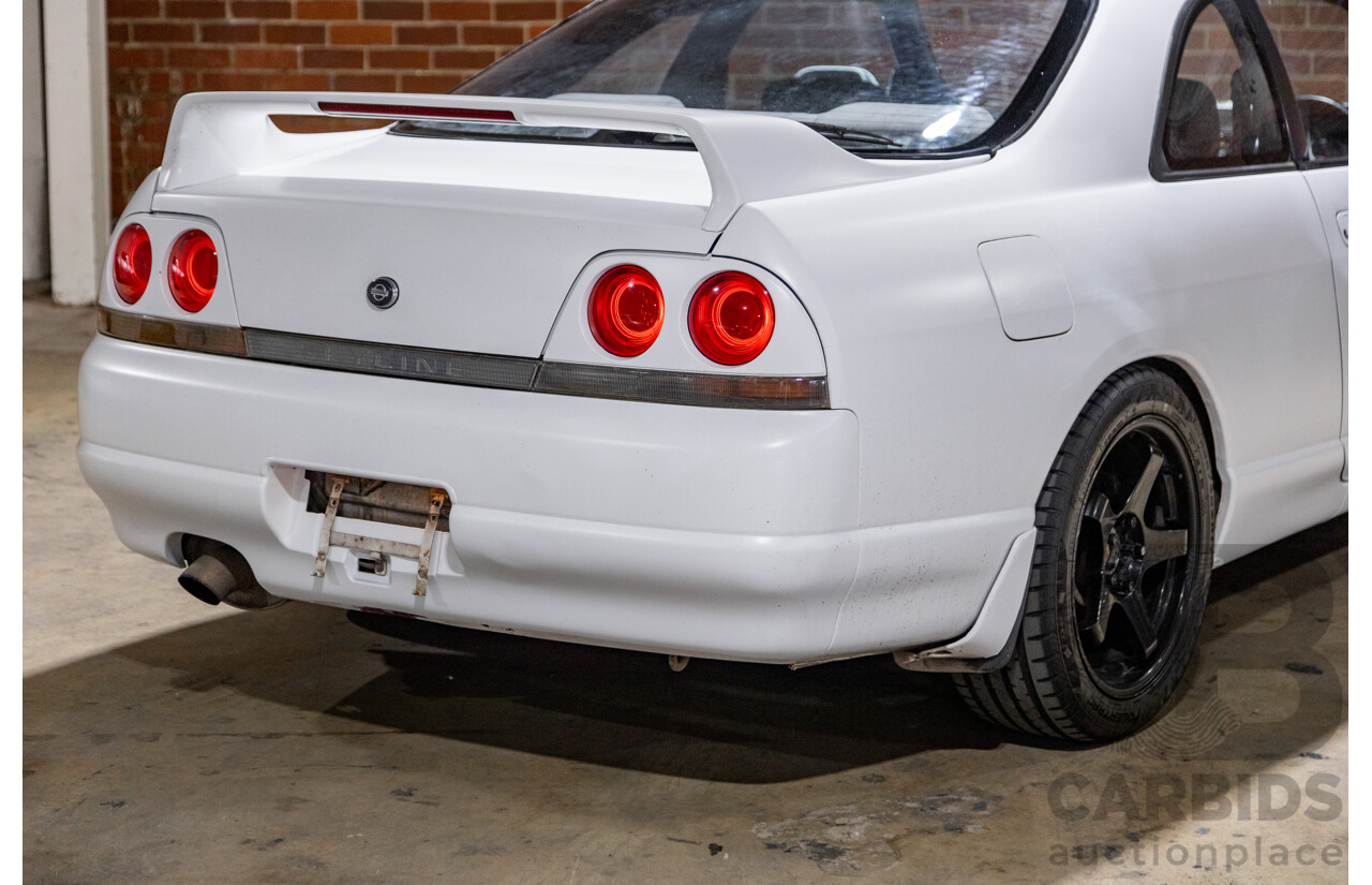 10/1994 Nissan Skyline R33 2d Coupe Ivory Matte White Wrap Turbo 4.0L - Modified with Barra Conversion - 07/2008 Import