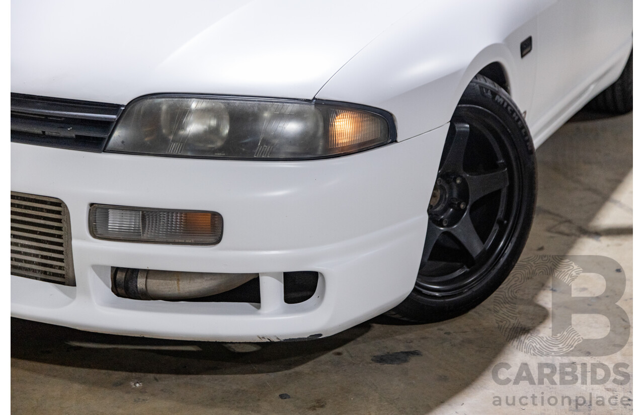 10/1994 Nissan Skyline R33 2d Coupe Ivory Matte White Wrap Turbo 4.0L - Modified with Barra Conversion - 07/2008 Import