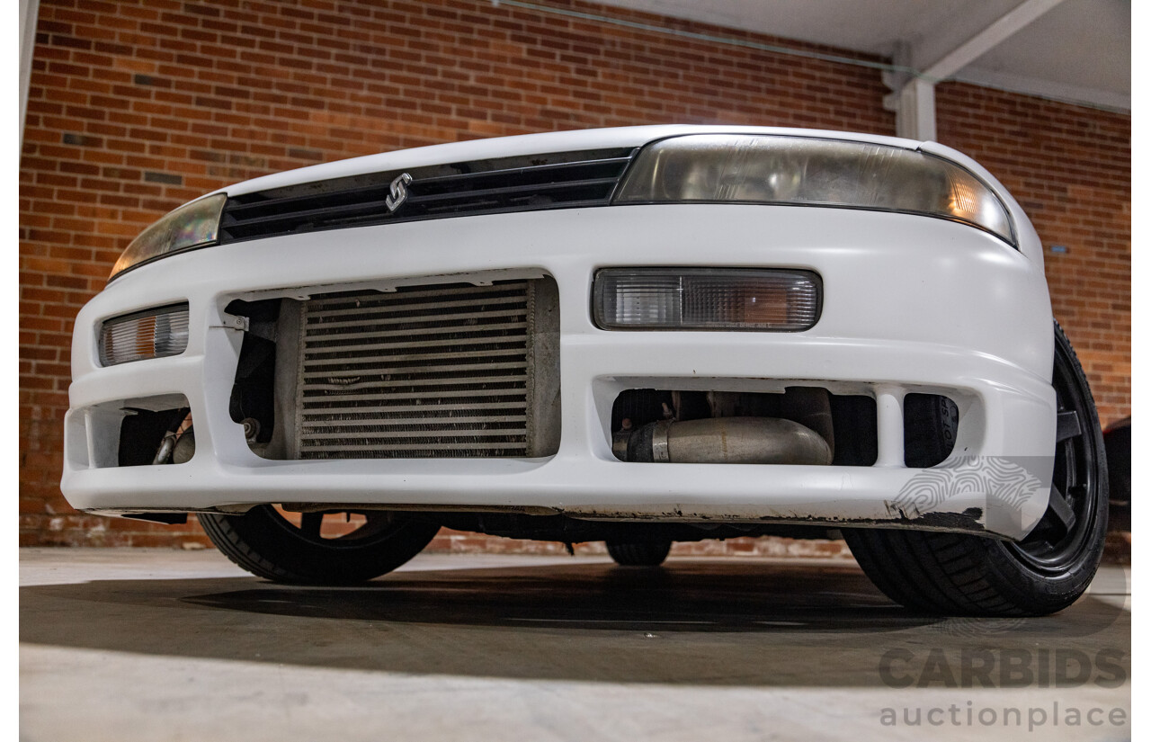 10/1994 Nissan Skyline R33 2d Coupe Ivory Matte White Wrap Turbo 4.0L - Modified with Barra Conversion - 07/2008 Import