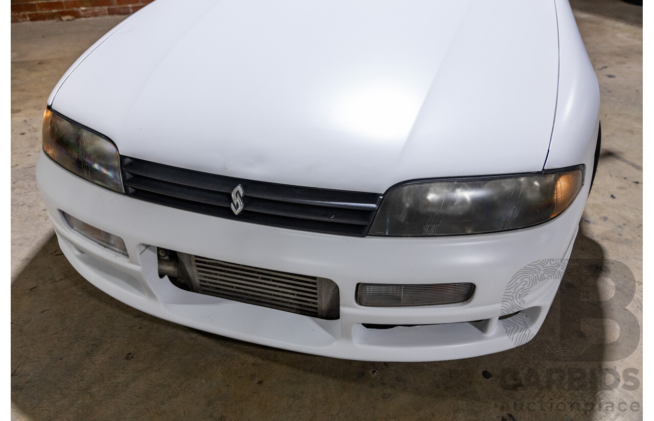 10/1994 Nissan Skyline R33 2d Coupe Ivory Matte White Wrap Turbo 4.0L - Modified with Barra Conversion - 07/2008 Import