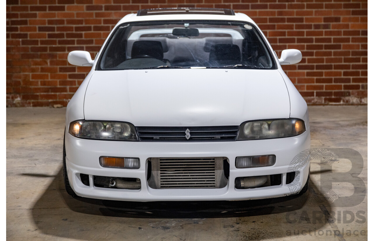 10/1994 Nissan Skyline R33 2d Coupe Ivory Matte White Wrap Turbo 4.0L - Modified with Barra Conversion - 07/2008 Import