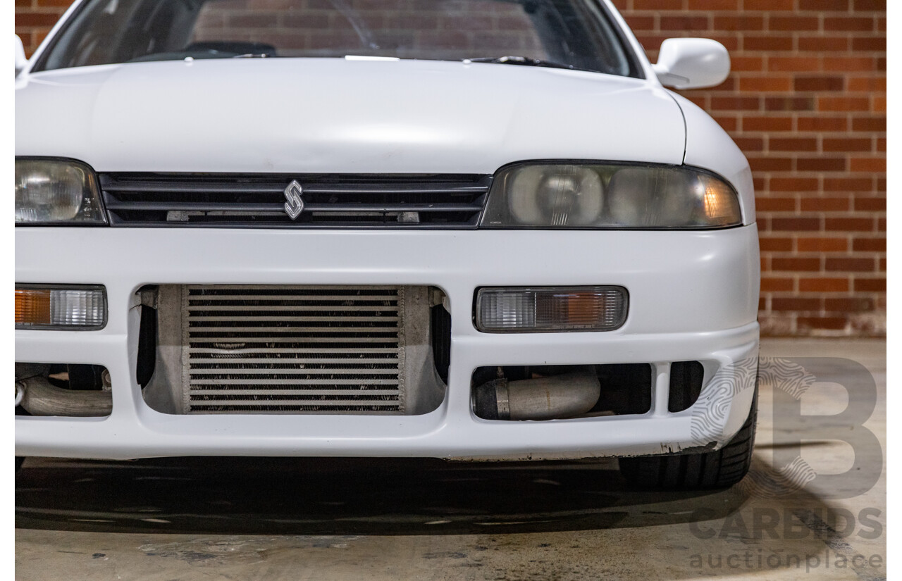 10/1994 Nissan Skyline R33 2d Coupe Ivory Matte White Wrap Turbo 4.0L - Modified with Barra Conversion - 07/2008 Import