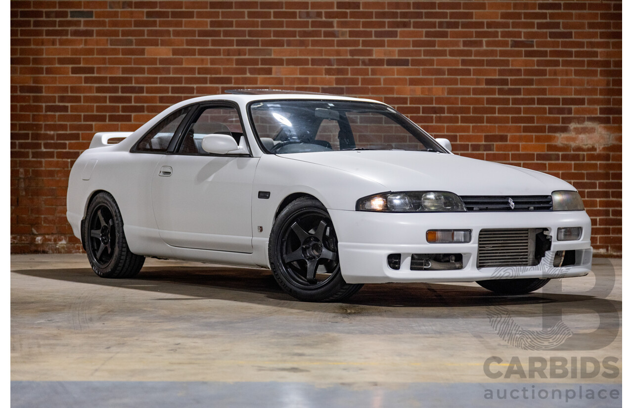 10/1994 Nissan Skyline R33 2d Coupe Ivory Matte White Wrap Turbo 4.0L - Modified with Barra Conversion - 07/2008 Import