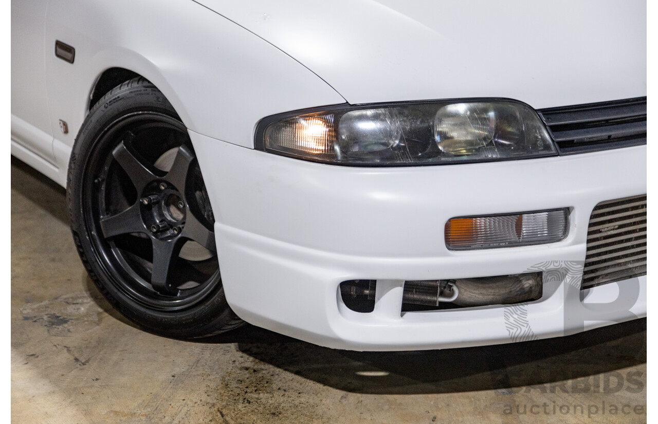 10/1994 Nissan Skyline R33 2d Coupe Ivory Matte White Wrap Turbo 4.0L - Modified with Barra Conversion - 07/2008 Import