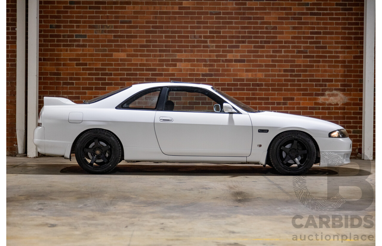 10/1994 Nissan Skyline R33 2d Coupe Ivory Matte White Wrap Turbo 4.0L - Modified with Barra Conversion - 07/2008 Import