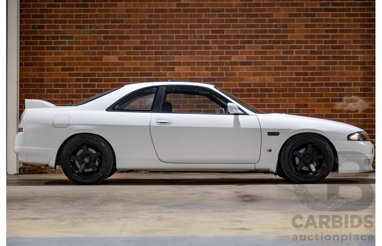 10/1994 Nissan Skyline R33 2d Coupe Ivory Matte White Wrap Turbo 4.0L - Modified with Barra Conversion - 07/2008 Import