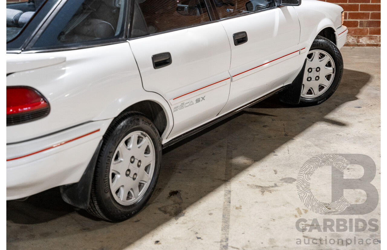 10/1990 Toyota Corolla SX SECA AE93 5d Liftback White 4A-GE 1.6L