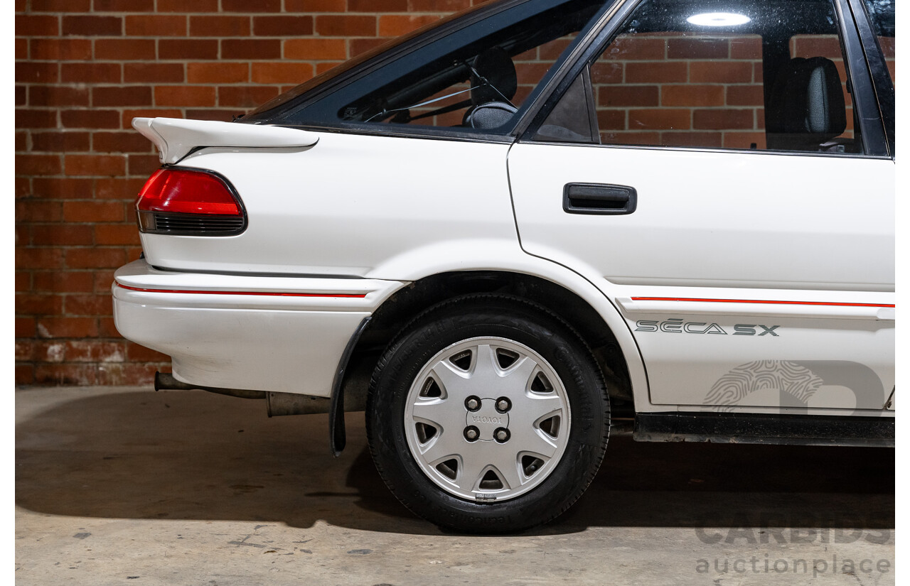 10/1990 Toyota Corolla SX SECA AE93 5d Liftback White 4A-GE 1.6L