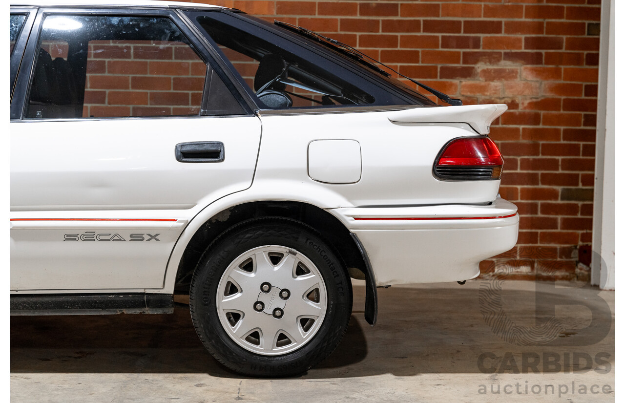 10/1990 Toyota Corolla SX SECA AE93 5d Liftback White 4A-GE 1.6L