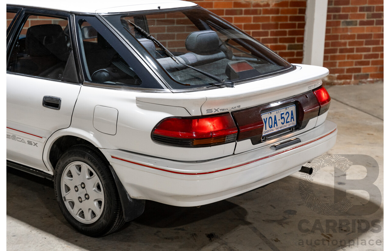 10/1990 Toyota Corolla SX SECA AE93 5d Liftback White 4A-GE 1.6L