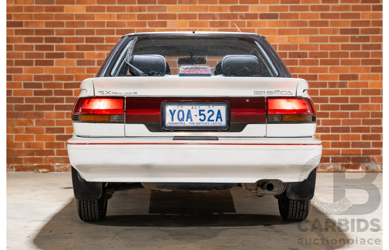 10/1990 Toyota Corolla SX SECA AE93 5d Liftback White 4A-GE 1.6L